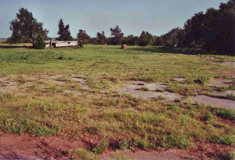 Standing close to the entrance looking onto the field with the snack bar