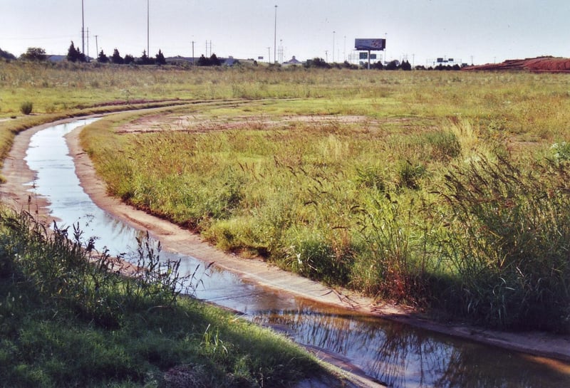 Today a canal marks the back perimeter of the Drive-In