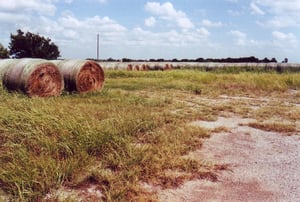 The field is used for storage of hay balls today