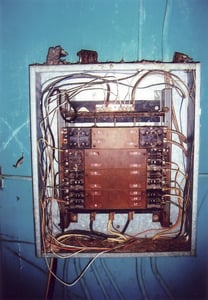 This device, hanging on the right wall inside the projection booth, probably is a fuse box