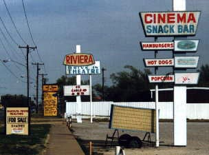 Riviera marquees and for sale sign.