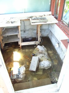 Inside Ticket Booth. Water is standing in the Floor area.