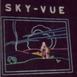 Sky-Vue at night, neon outline of the Pioneer Woman statue