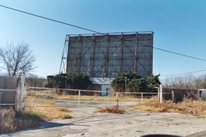 This is screen of the defunct Skyway Drive In off Old, Old US 66 near Sapulpa, OK.  The old pavement parallels OK 66, formerly New US 66.  Old pavement crosses a single-lane truss bridge with brick floor and rejoins OK 66 just east of Turner Turnpike.