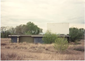 Screen tower with projection building in foreground, Stadium Drive-In, Alva OK