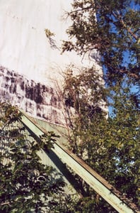 One of a number of heavy steel beams preventing the screen tower from toppling over into the lot