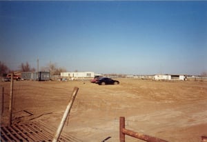 Taken from the southwest corner of the lot.  The cattle guard is approximately where the theatre entrance was.  The screen tower was located just adjacent to the north of the entrance, facing east ... slightly northeast.  The projection/concession buildin