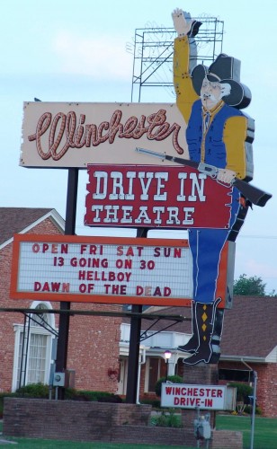 Photo of the Winchester Drive-In Sign Taken from across the street.
Note the odd line up:
13 going on 30 (family film) followed by
Hellboy and Dawn of the Dead (more in the horror line-up)
With this hi-res photo, you can see a access opening/hatc