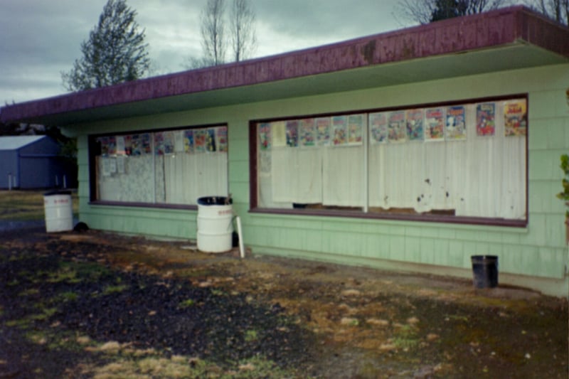 The old viewing room windows decorated with drive-in comic book covers