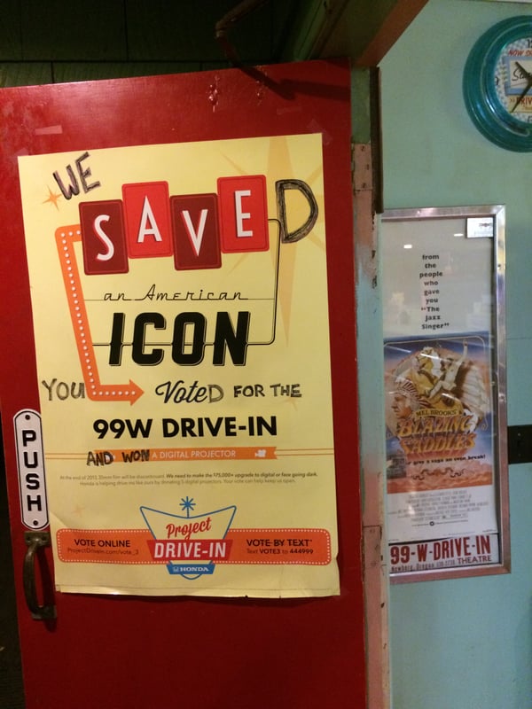 This Honda Project Drive In Poster was altered by our voting fans in celebration of the news that the 99w Drive in was to receive one of the digital projectors from the initiative.