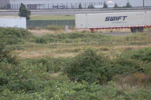 Parking berms are still barely visible in the middle of the dirt track.