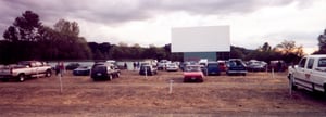 Panoramic of the field, concessions/project building, and the screen