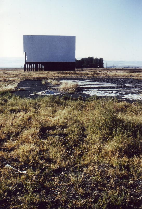 Screen with remains of concrete projection/concession building platform in
front