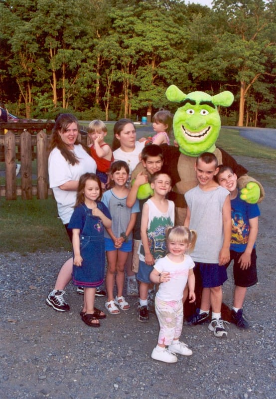 Shrek poses with the young patrons