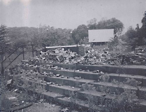The remnants of the concession stand and projection booth. The rubble was somewhat charred...I believe that the building had burned at some point.