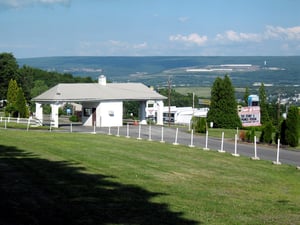 THE ENTRANCE ROAD AND TICKET BOOTH