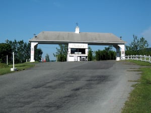 ROAD VIEW SHOT OF THE TICKET BOOTH TAKEN BY DAY.