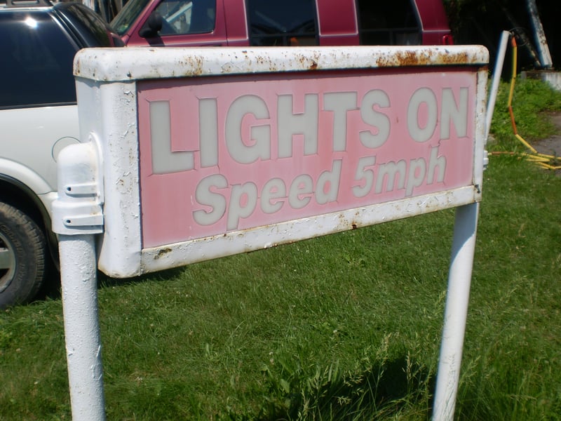 lights on sign at entrance