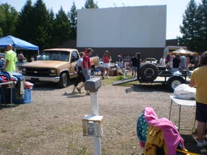 one of the screens as seen during a Sunday flea market day