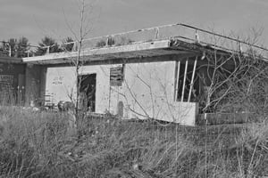 A view of the concession stand, with the viewing deck on the roof of the building.