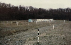 Speaker poles and partially demolished snack bar/projection room