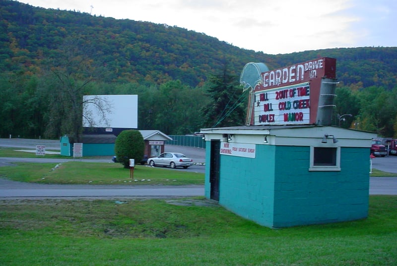 Screen, marquee, and ticket booth.
