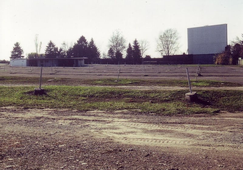 Field showing all the speaker poles without speakers and junction boxes