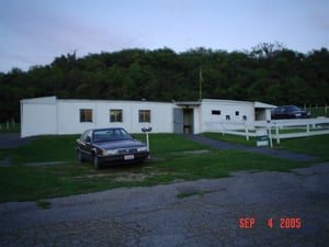 This is the concession/projection building with my '89 Eagle Premier parked directly in front of it. Notice the working speakers on the pole.