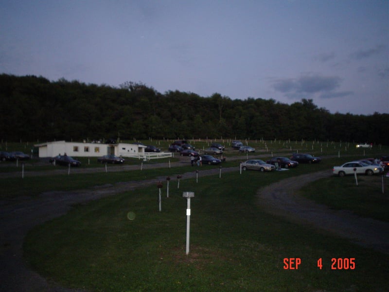 a view of the field, uphill...Taking outdoor pictures with a flash when it's almost dark seems to keep the picture in focus better with a digital camera.