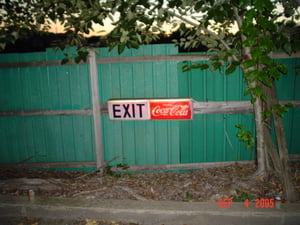 exit sign with Coca-Cola logo