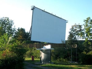 OLD TICKET BOOTH AND SCREEN. CARS ARE DIRECTED TO GO TO THE NEW BOOTH, LOCATED IN THE REAR OF THE CONCESSION BUILDING.