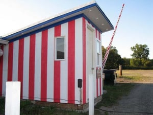 NEW TICKET BOOTH. TRAFFIC IS DIRECTED TO GO TO THE REAR OF THE CONCESSION.