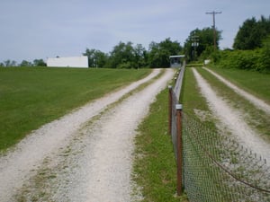 entrance, current ticket booth and a portion of the screen, as seen from the front gate