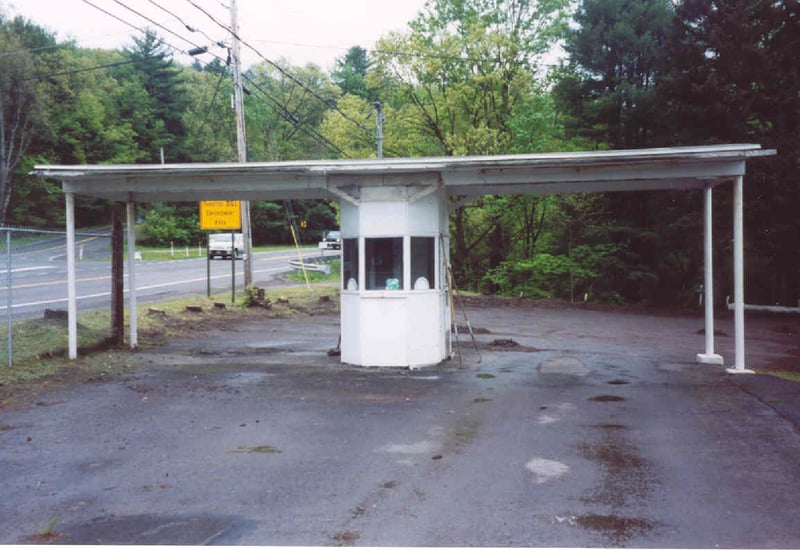 Ticket booth. The natural tree barrier that lined Route 6 has also been removed (note all the tree stumps on the left).