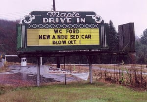 Marquee and ticket booth in background