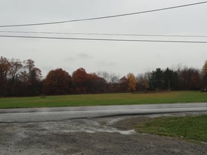 former site-empty field now