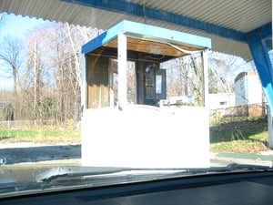 Picture taken as the concession stand was being leveled. Ticket booth. Taken with digital camera.