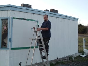 Andrew, our painter, working hard on the "old" ticket booth