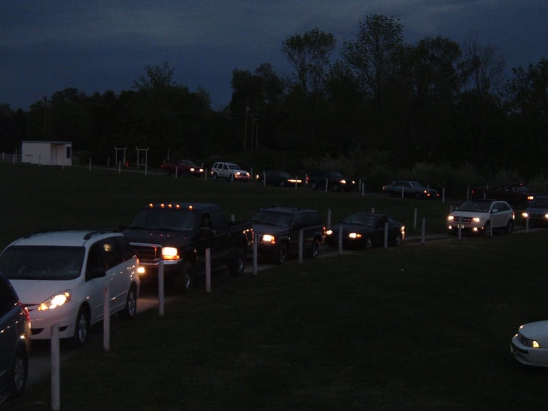 A big line of cars waiting to get in at the Pike. Shrek the Third is the big movie tonight.