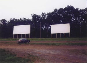 These are screens 4 and 5, right to left, and are located behind the concession building. I estimated the capacity to be at about 25 cars for each of these screens.