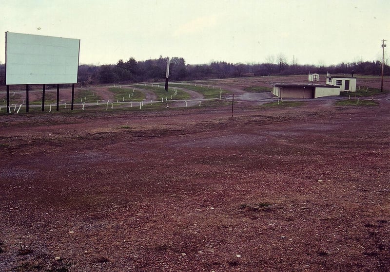 Field showing concession building/projection booth for screen no. 1 and screens no. 2 and 3