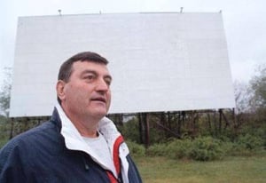 owner/current Starlite president Frank Royer, standing in front of its original 1949 40x93 screen.(from Digital Collegian)