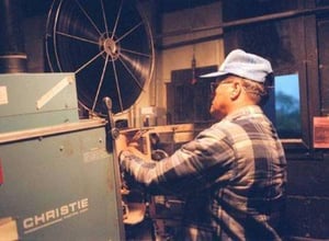 projectionist John Lee, loading up a reel(Titanic) for the show