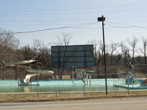 Back of screen from road looking across pool