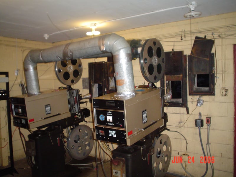 The projection booth had a duel-projector setup with hour-long reels.