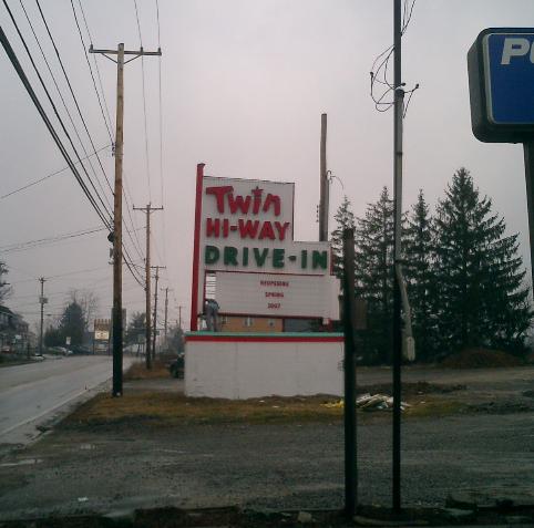 New Twin Hi-way drive in sign being installed