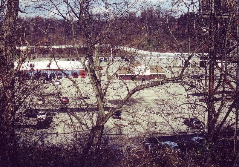 Looking down to the projection/concession building (brown/white) from the elevated spot of the screen