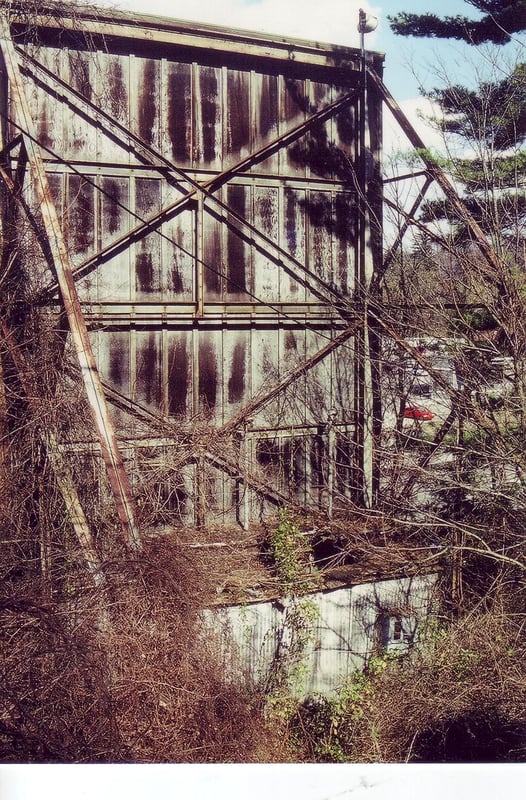 Decaying shack at the bottom of the screen