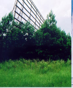 As noted, this drive-in, located along the north edge of Sumter, has been closed for several years.  The only obvious remains of the drive-in is the screen framework.  Small pine-trees obstructed my ability to see any other structure.  Additional photos t