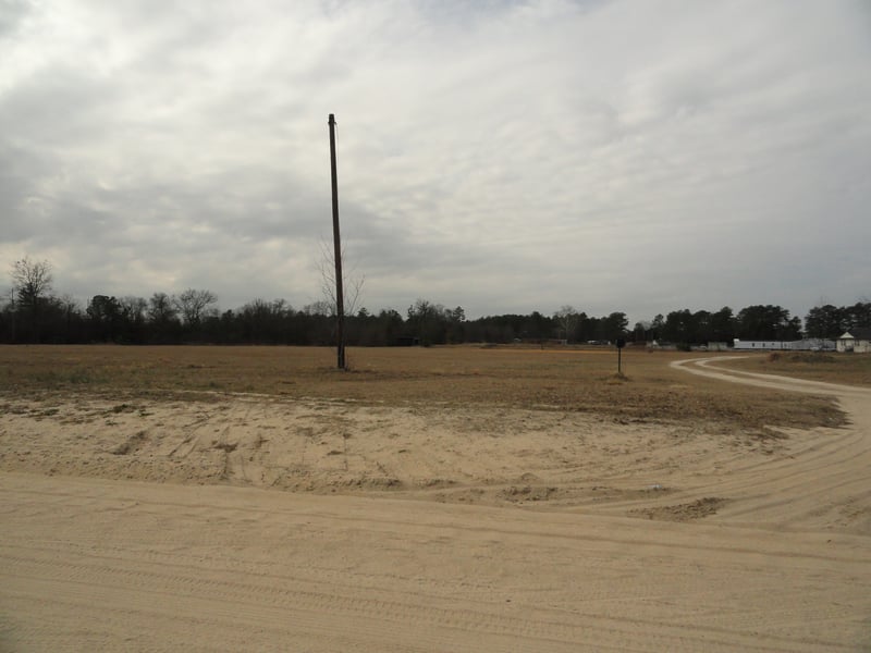 Former site is now baseball diamond and empty field at the NW corner of Chariot and Hendrix